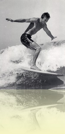 Barry ‘Magoo’ McGuigan on a wave, photographer unknown, c1950s. Courtesy Barry McGuigan++