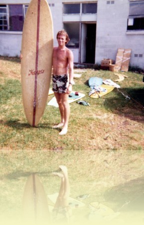 Steve Abbott holding Rob Hitchens’s surfboard, Narrabeen, Donna Abbott, 1977. <br>Courtesy and © Donna Abbott++