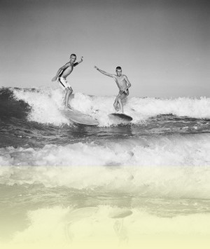 Riding the breakers on a surfboard at Tamarama Beach, John Tanner, 1960.<br/>National Archives of Australia: A1200, L34988. © Commonwealth of Australia++